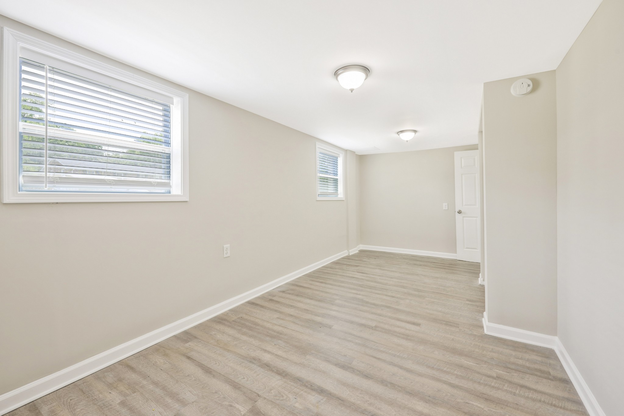 318 Bonnahurst Drive Hermitage, TN 37076 - Photo 30 of 30 a view of an empty room with wooden floor and a window