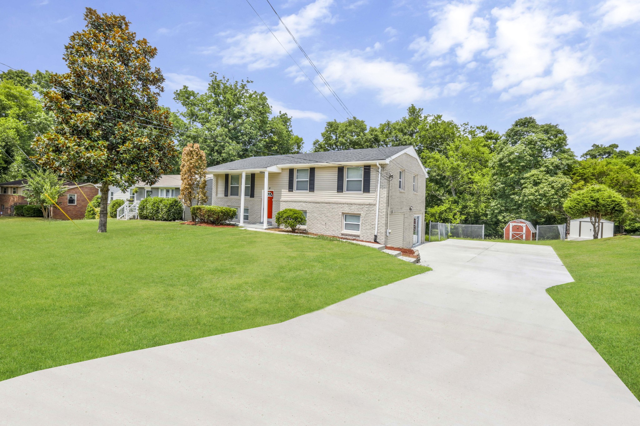 318 Bonnahurst Drive Hermitage, TN 37076 - Photo 3 of 30 a front view of house with yard and green space