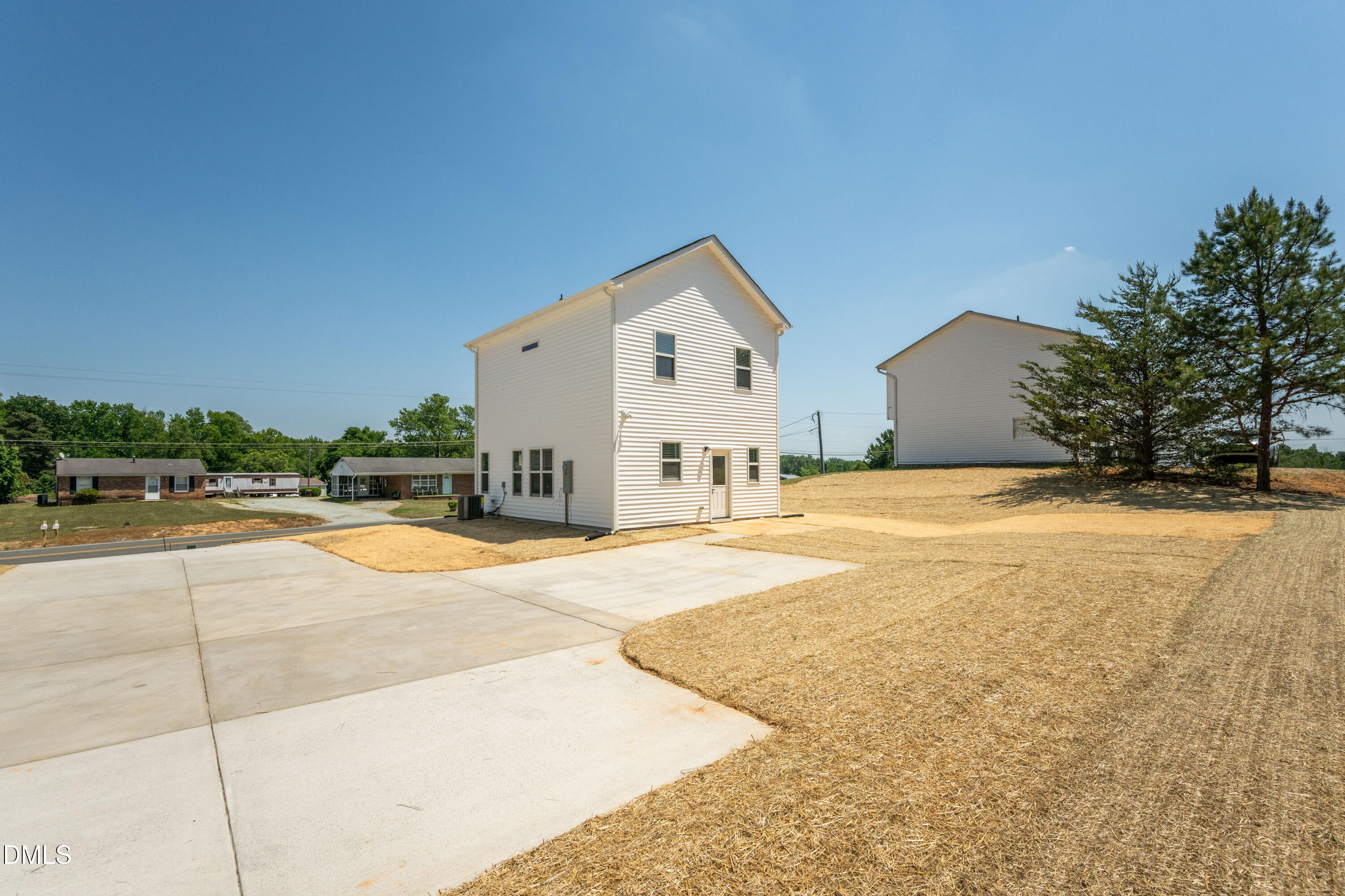 1196 Hurdle Mills Road Roxboro, NC 27573 - Photo 42 of 50 a view of a house with swimming pool