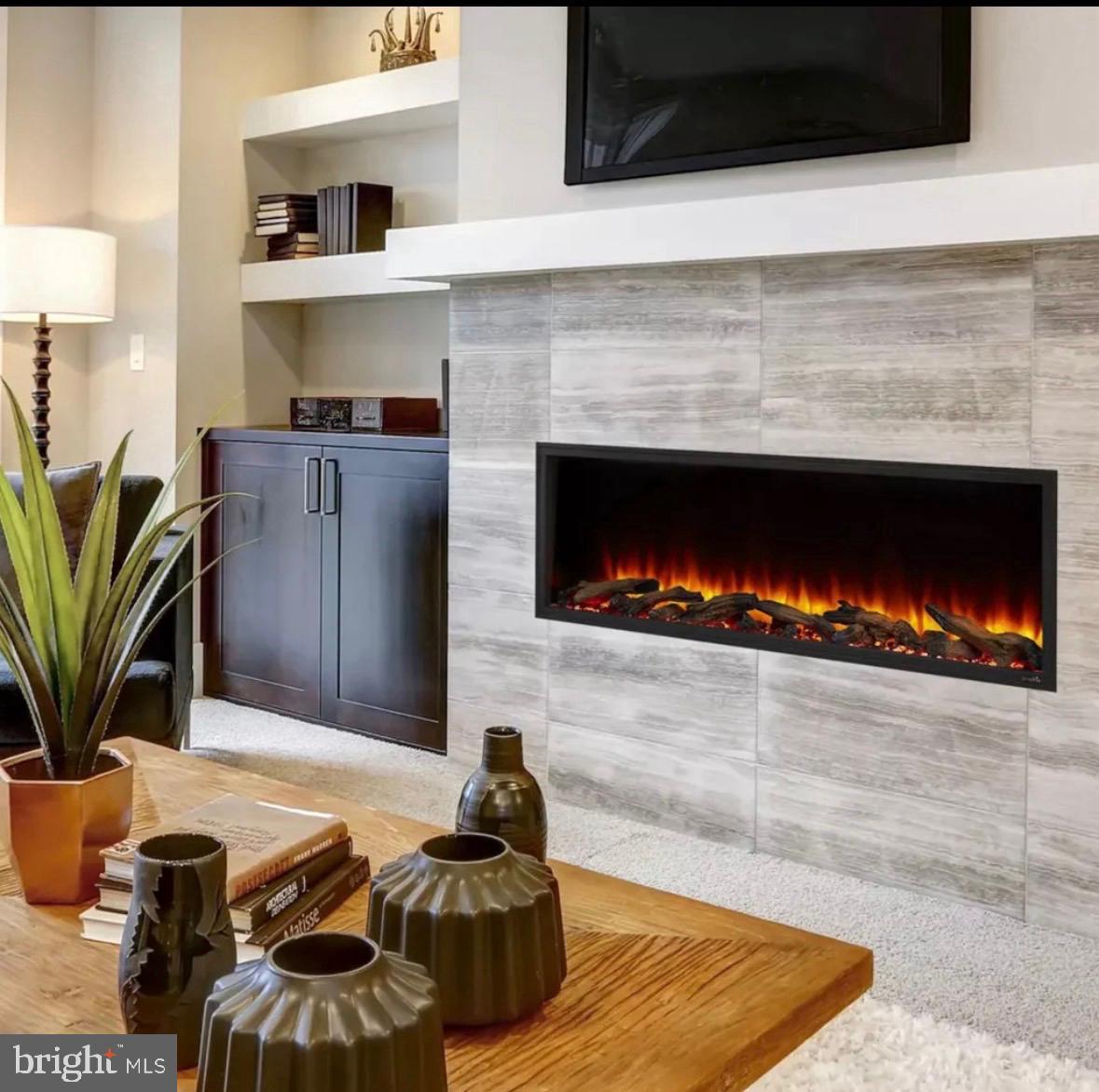 2 Windsor Drive King George, VA 22485 - Photo 11 of 60 a kitchen with furniture and a fireplace