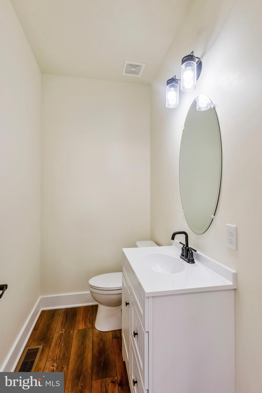 2 Windsor Drive King George, VA 22485 - Photo 34 of 60 a bathroom with a sink and a mirror
