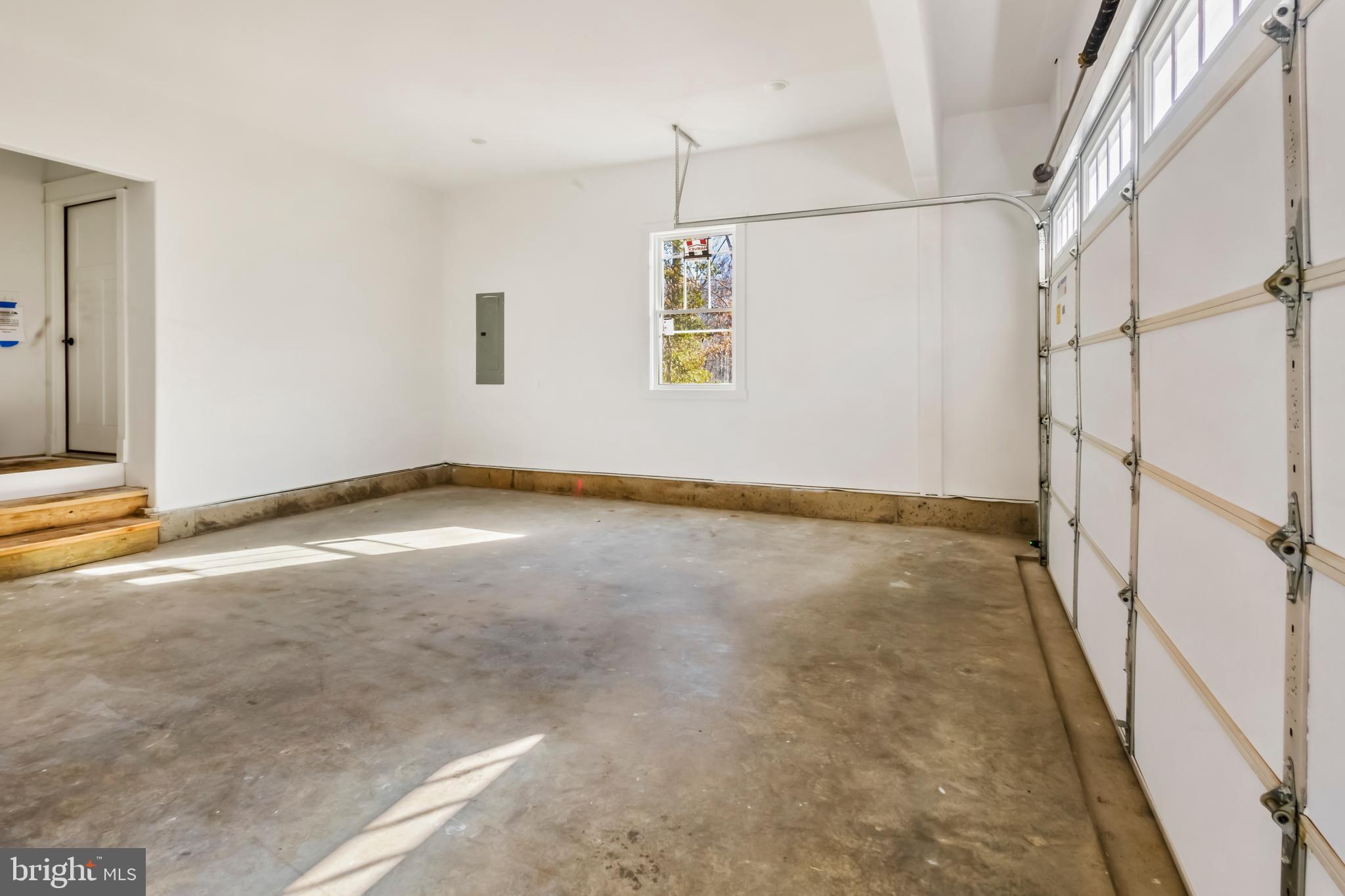 2 Windsor Drive King George, VA 22485 - Photo 40 of 60 a view of a hallway with wooden floor and staircase