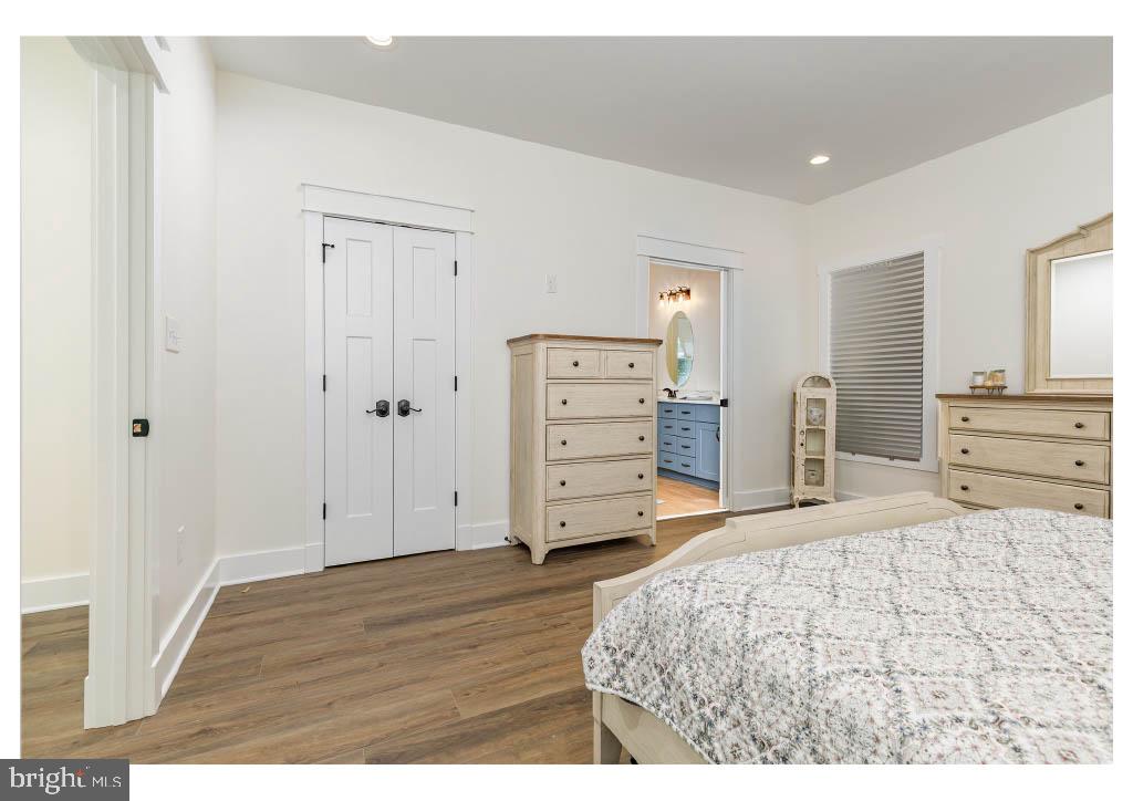 2 Windsor Drive King George, VA 22485 - Photo 50 of 60 a large bedroom with a bed and wooden floor