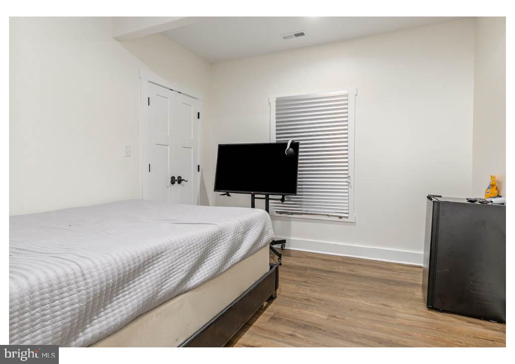 2 Windsor Drive King George, VA 22485 - Photo 53 of 60 a bedroom with a bed and a flat screen tv