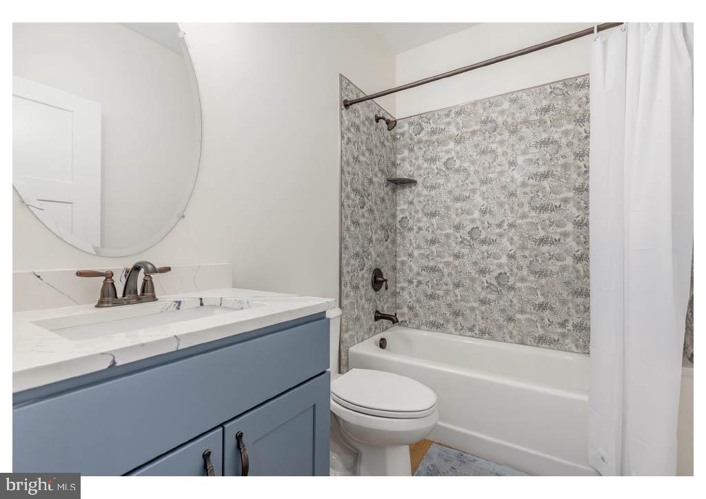 2 Windsor Drive King George, VA 22485 - Photo 55 of 60 a bathroom with a sink a toilet and shower