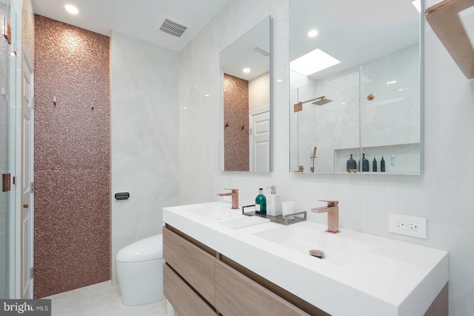 3332 Dent Place Northwest Washington, DC 20007 - Photo 15 of 46 Sleek modern bathroom with elegant finishes.