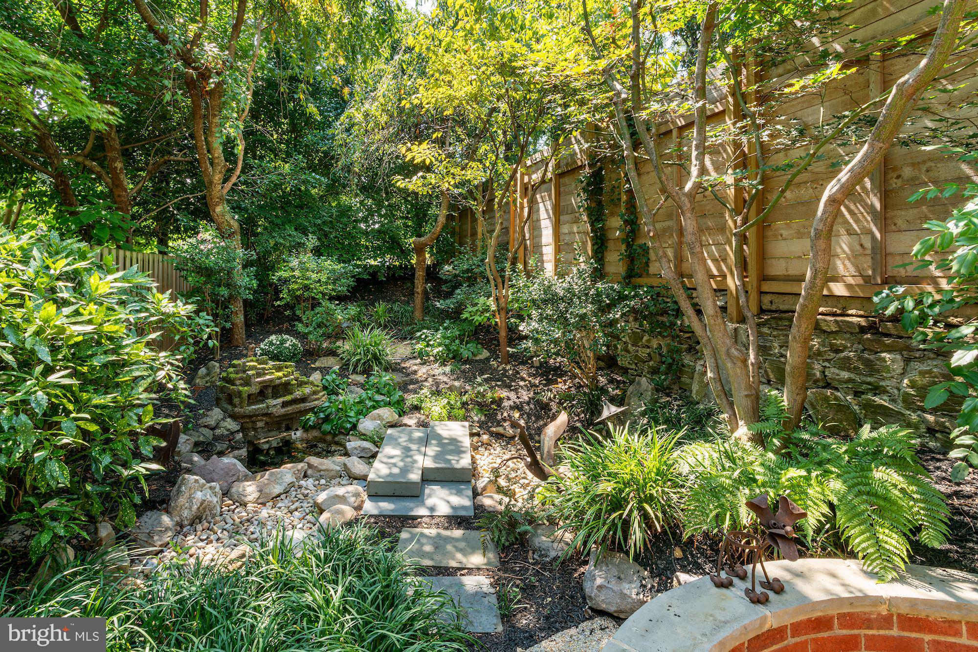 3332 Dent Place Northwest Washington, DC 20007 - Photo 24 of 46 Serene garden retreat with lush greenery.