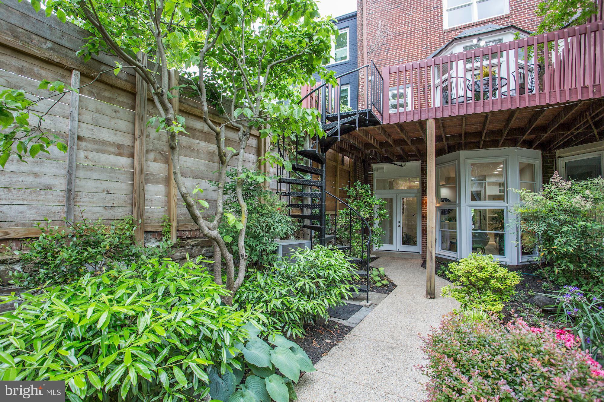 3332 Dent Place Northwest Washington, DC 20007 - Photo 25 of 46 Lush garden retreat with spiral stairs.