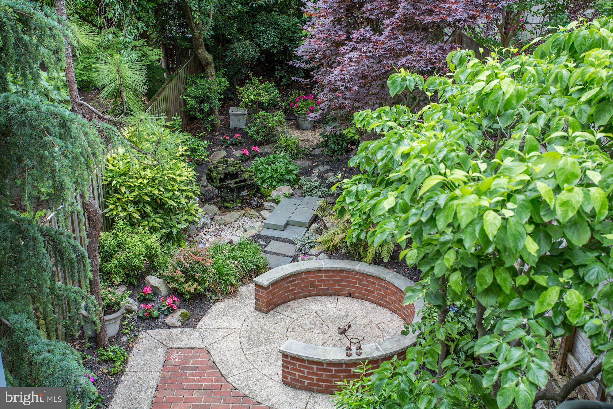 3332 Dent Place Northwest Washington, DC 20007 - Photo 28 of 46 Lush garden retreat with serene pathways.