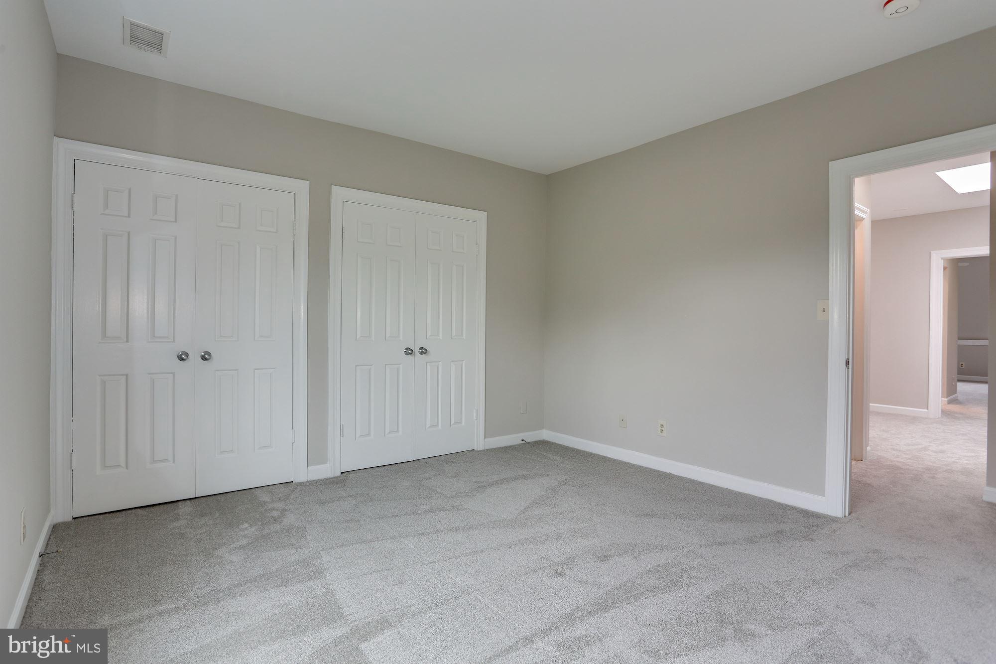 3332 Dent Place Northwest Washington, DC 20007 - Photo 43 of 46 Spacious room with soft, neutral tones.