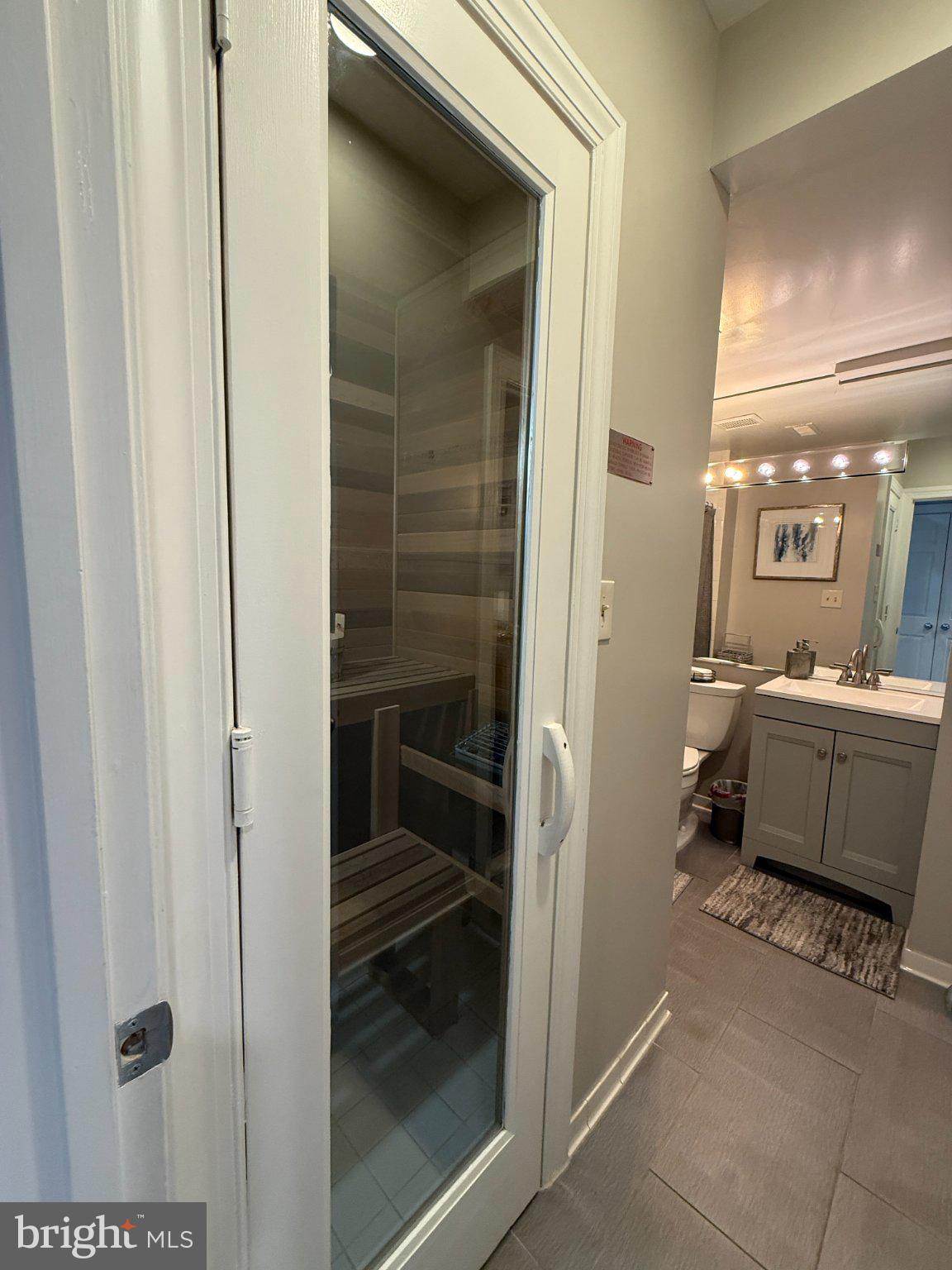 3332 Dent Place Northwest Washington, DC 20007 - Photo 45 of 46 Modern sauna retreat in serene bath.