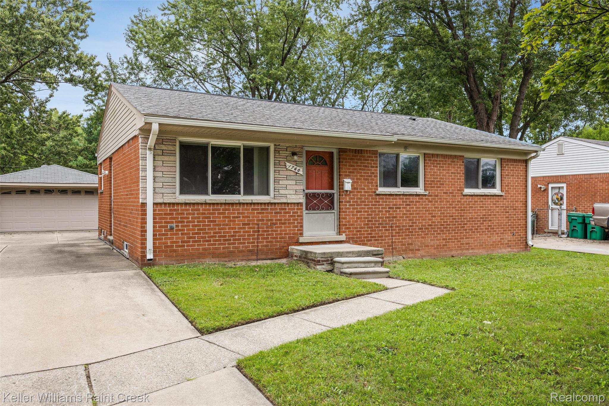 1766 Henry Ruff Road Garden City, MI 48135 - Photo 32 of 36 Brick and stone facade with horizontal siding accents