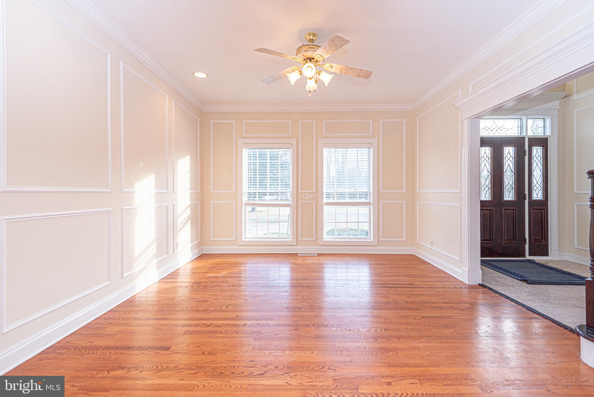 12004 Turtle Mill Road Bishopville, MD 21813 - Photo 36 of 69 a view of an empty room with window and wooden floor