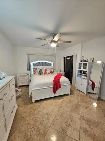 a kitchen with a sink and refrigerator
