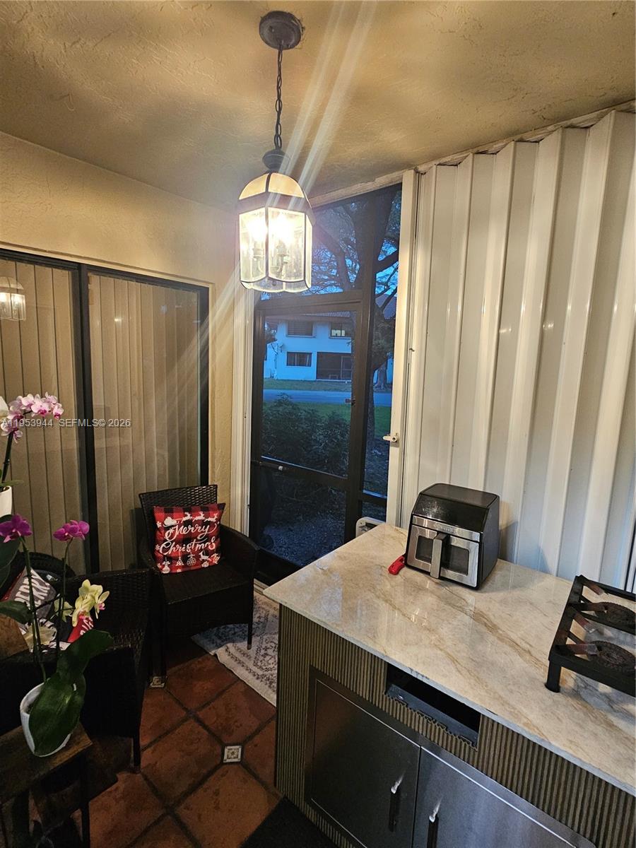 9781 Southwest 138th Avenue, Unit DB1R Miami, FL 33186 - Photo 15 of 16 a kitchen with a sink and refrigerator