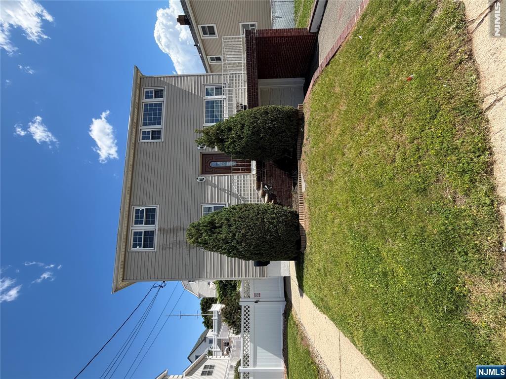 53 Devon Terrace, Unit 2 Kearny, NJ 07032 - Photo 15 of 15 a view of a backyard of the house