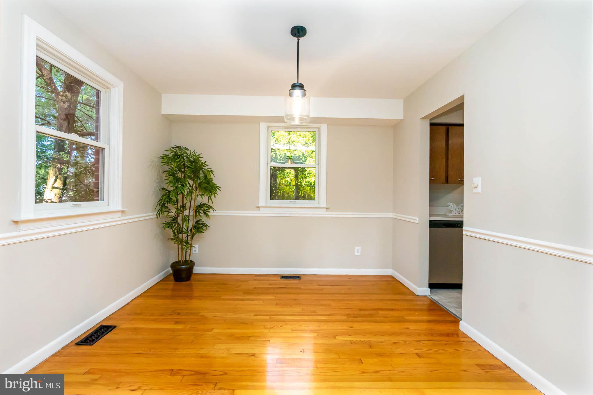 409 Fieldstone Court Fallston, MD 21047 - Photo 12 of 53 a view of empty room with window and outdoor space