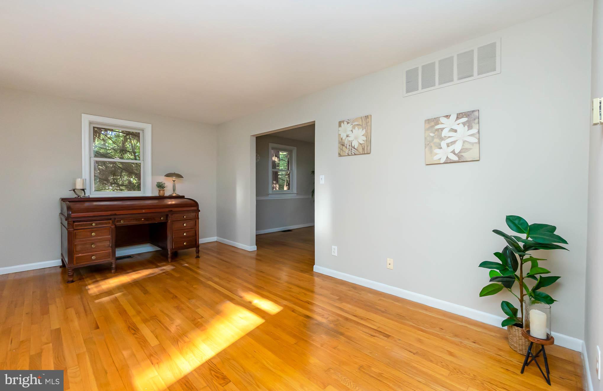 409 Fieldstone Court Fallston, MD 21047 - Photo 14 of 53 a bedroom with a bed and a potted plant