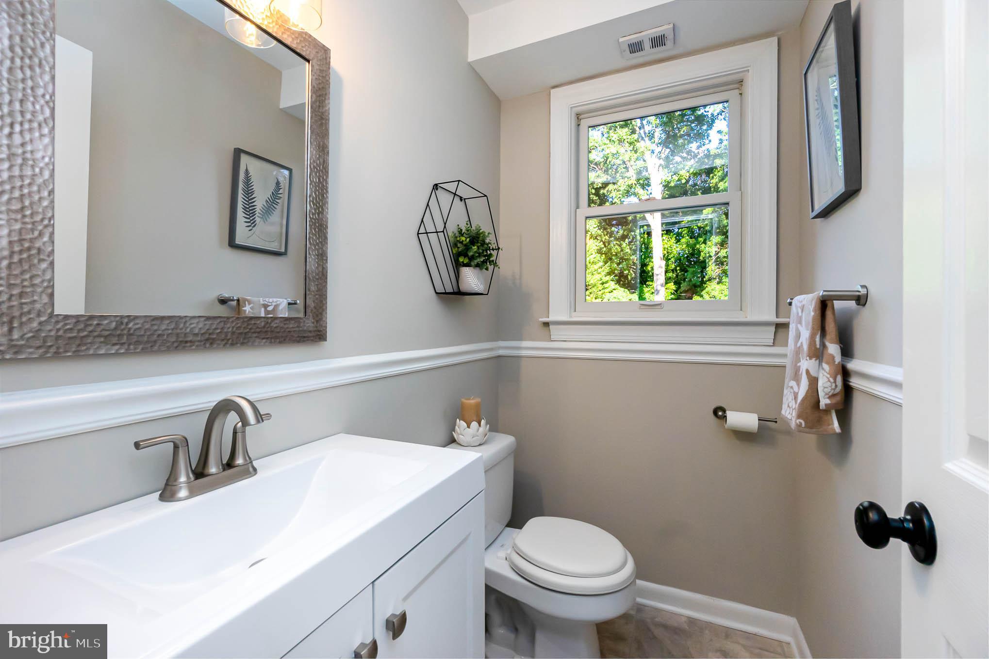 409 Fieldstone Court Fallston, MD 21047 - Photo 16 of 53 a bathroom with a sink a toilet and a mirror
