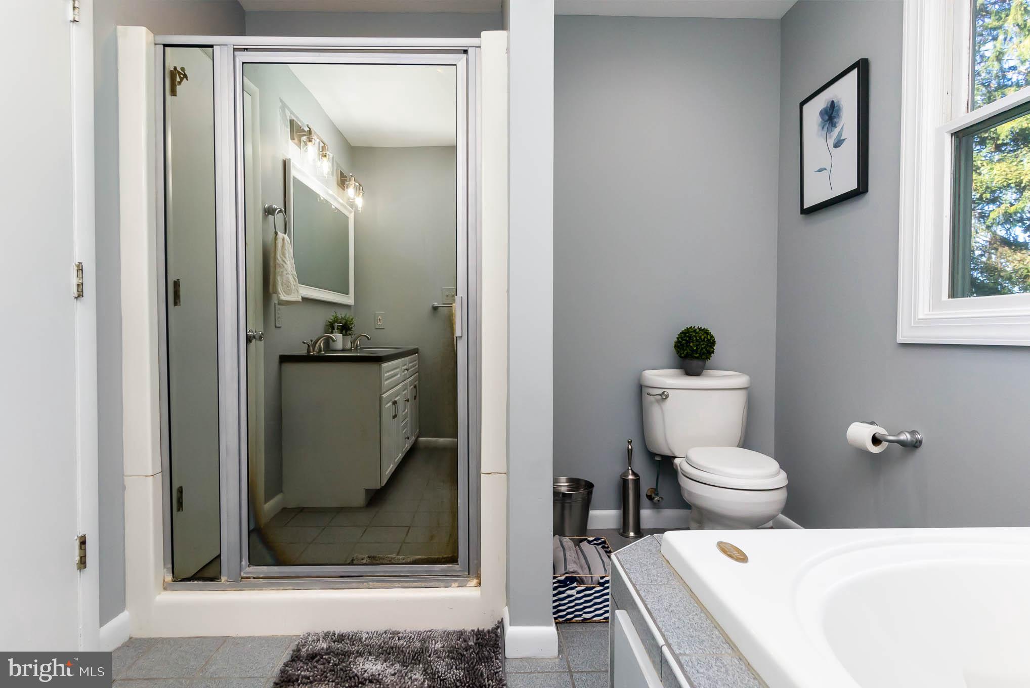 409 Fieldstone Court Fallston, MD 21047 - Photo 22 of 53 a bathroom with a toilet and a shower