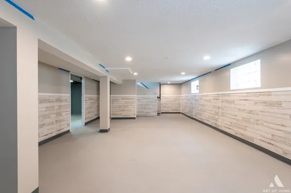 an empty room with fireplace
