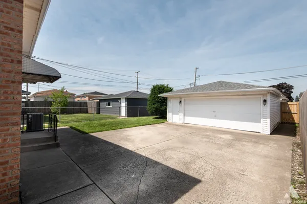 a view of a back yard of the house