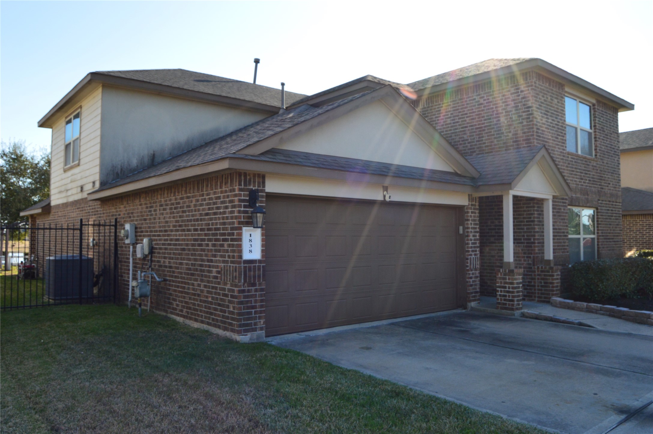 1838 Luminous Waters Lane Rosharon, TX 77583 - Photo 3 of 9 a view of a house with brick walls