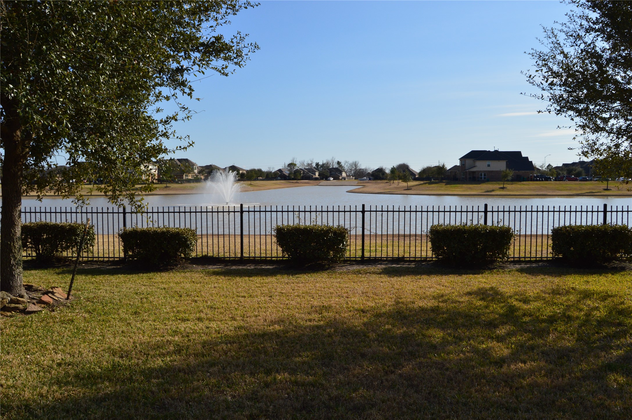 1838 Luminous Waters Lane Rosharon, TX 77583 - Photo 6 of 9 a view of a garden with wooden fence