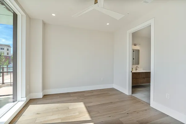 a view of an empty room and window