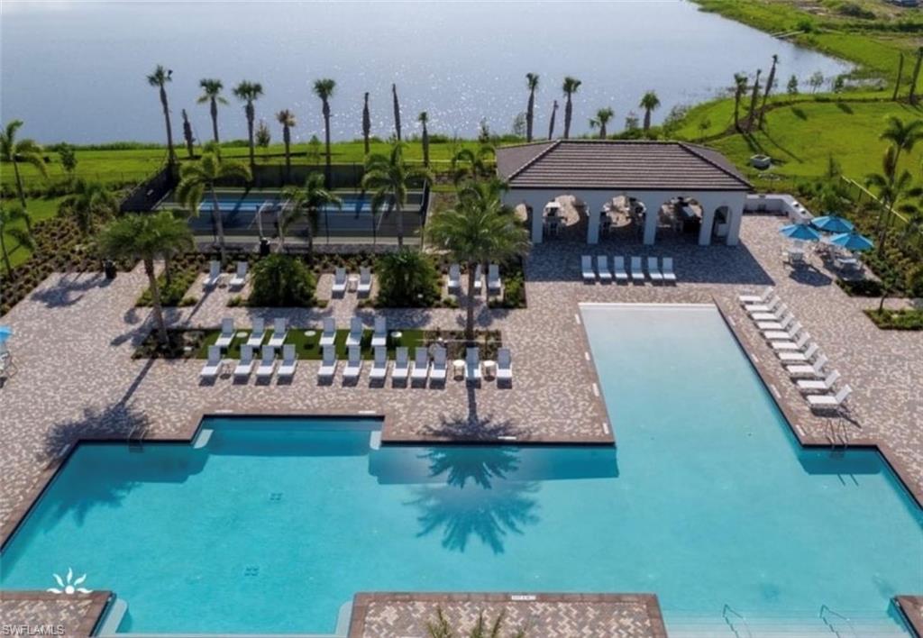 5105 Penella Ave Ave Avenue Immokalee, FL 34142 - Photo 24 of 37 a view of a swimming pool with a patio