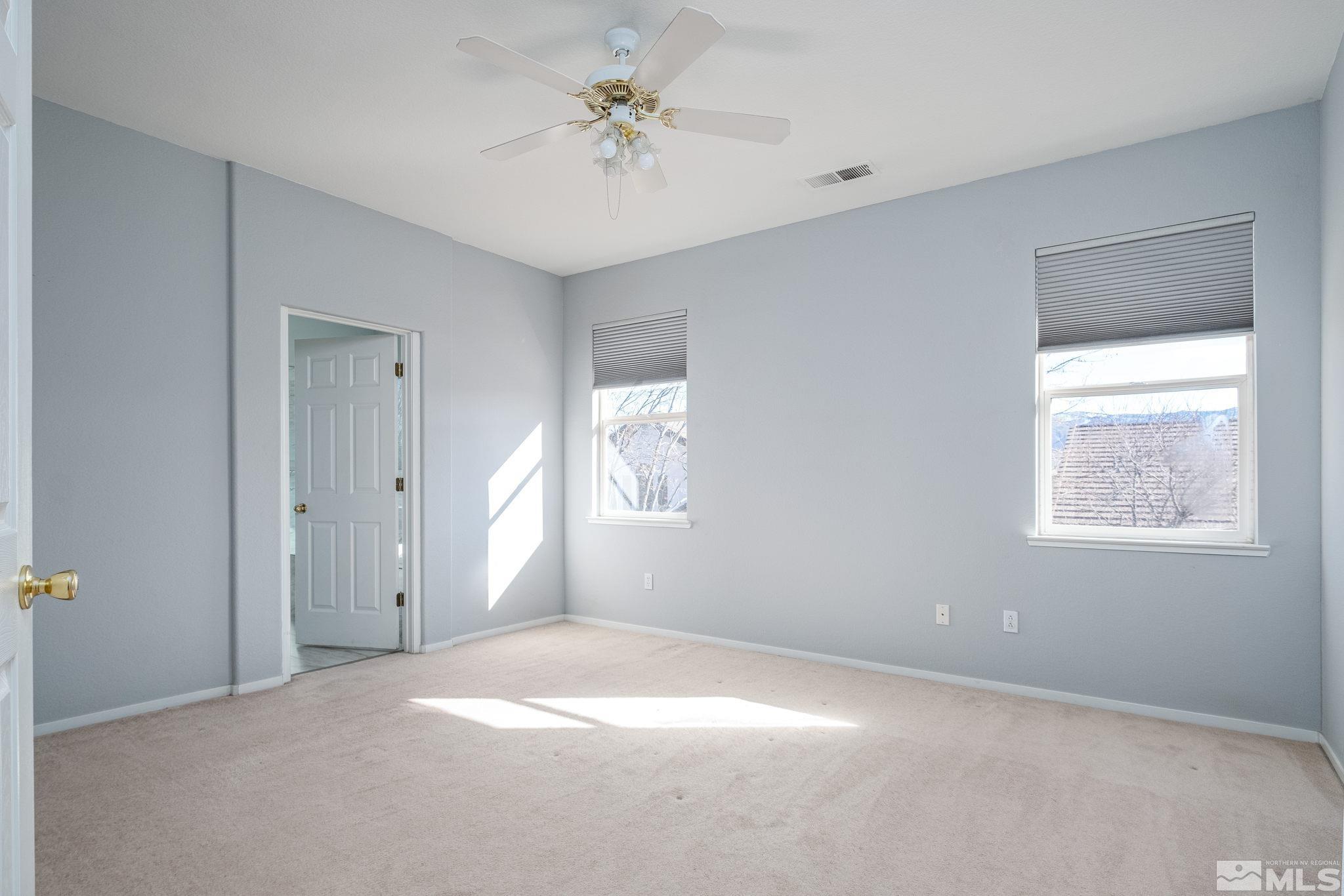 9430 Oakley Lane Reno, NV 89521 - Photo 17 of 28 a view of an empty room with a window