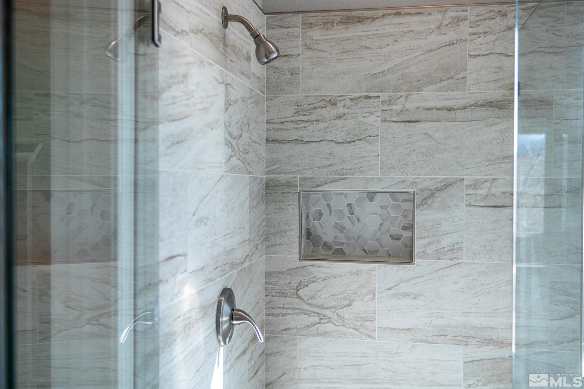 9430 Oakley Lane Reno, NV 89521 - Photo 24 of 28 a bathroom with a shower