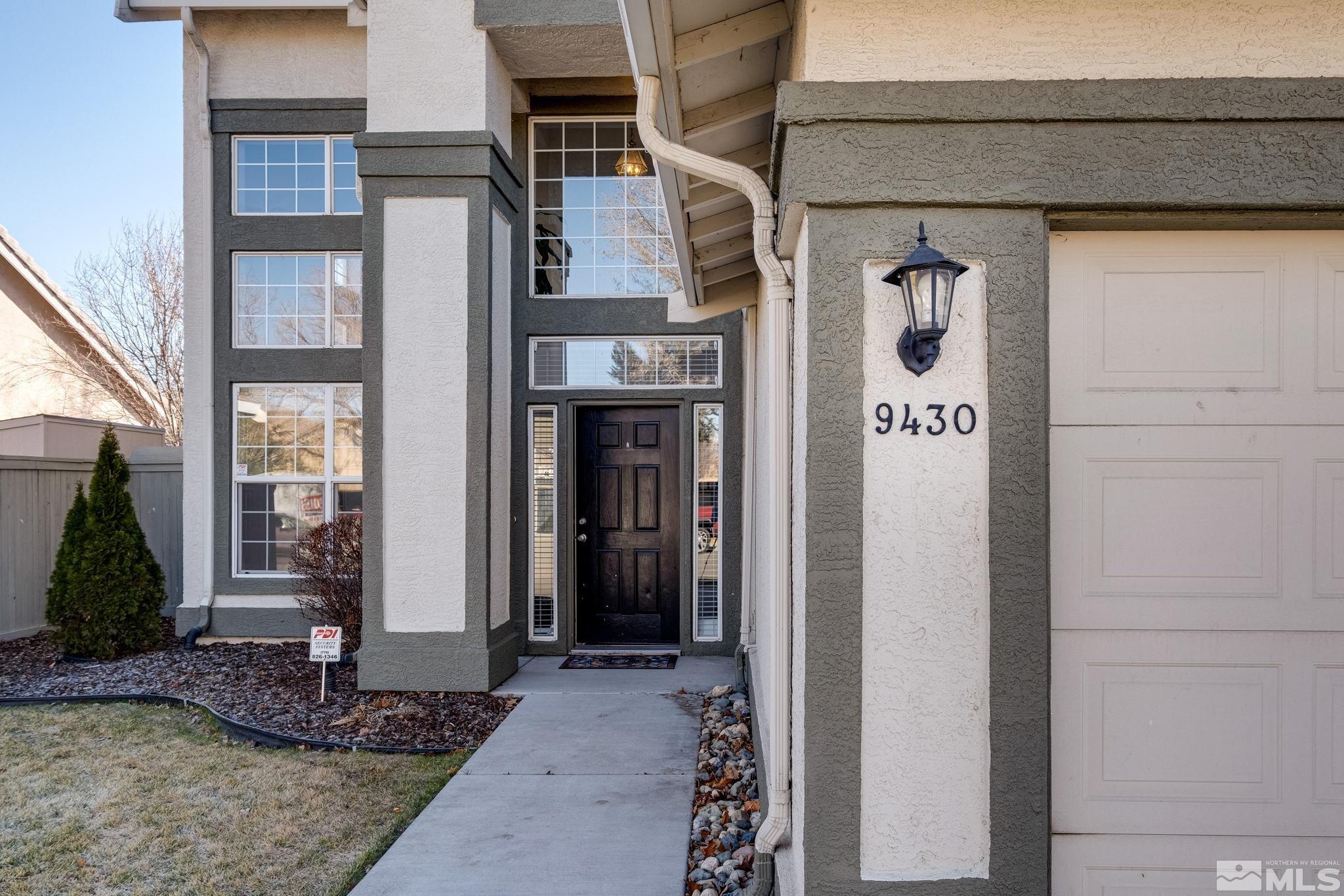 9430 Oakley Lane Reno, NV 89521 - Photo 4 of 28 a sign that is on the side of a building