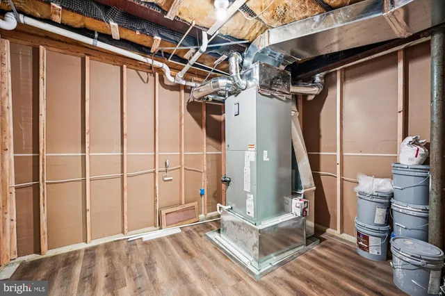 a view of a house with wooden floor and iron stairs