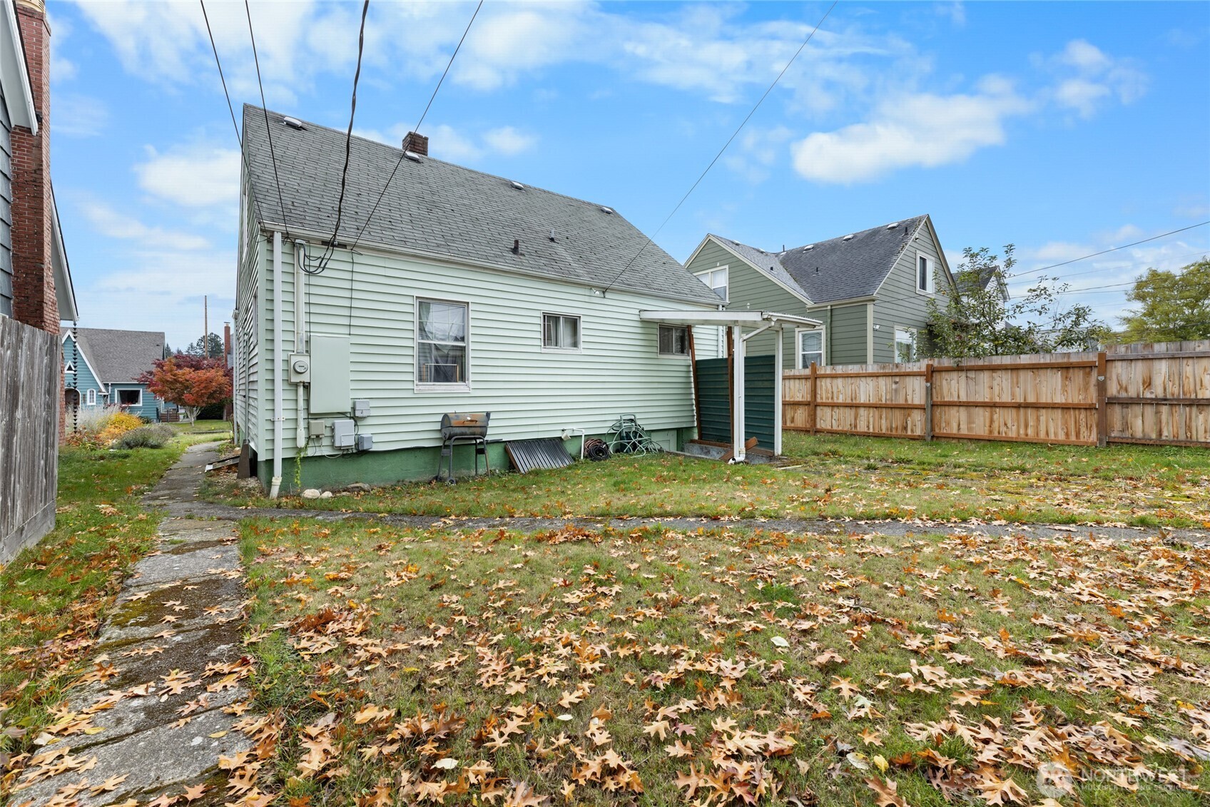 4830 South C Street Tacoma, WA 98408 - Photo 17 of 22 a view of a house with a yard