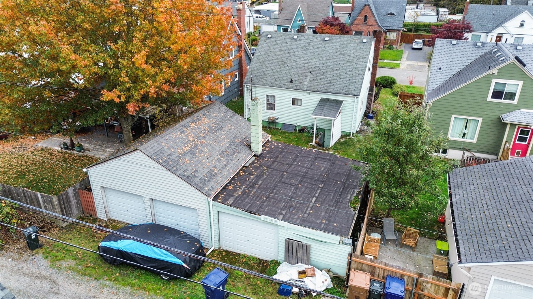 4830 South C Street Tacoma, WA 98408 - Photo 20 of 22 a aerial view of a house with a garden and plants