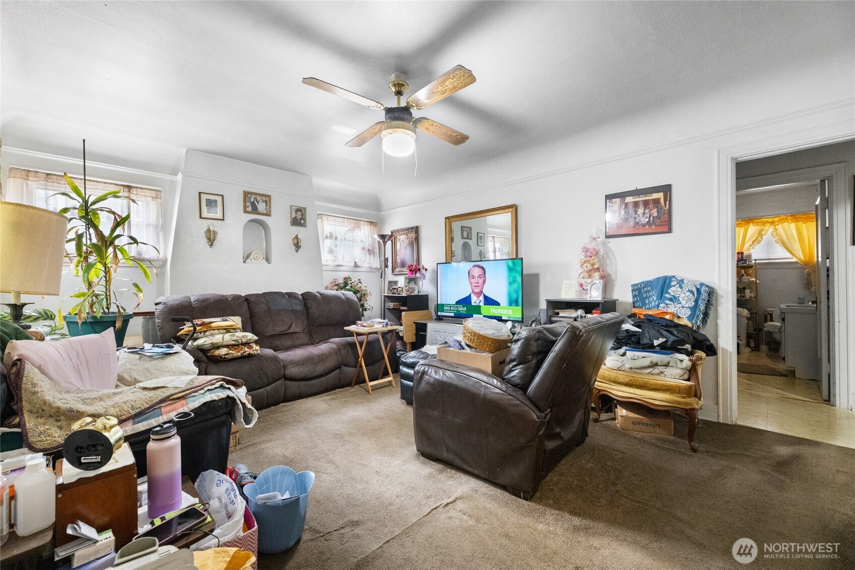 4830 South C Street Tacoma, WA 98408 - Photo 3 of 22 a living room with furniture and a flat screen tv