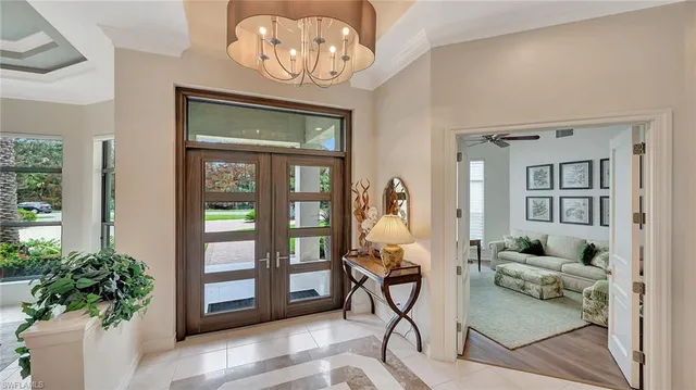a view of a livingroom with furniture window and wooden floor