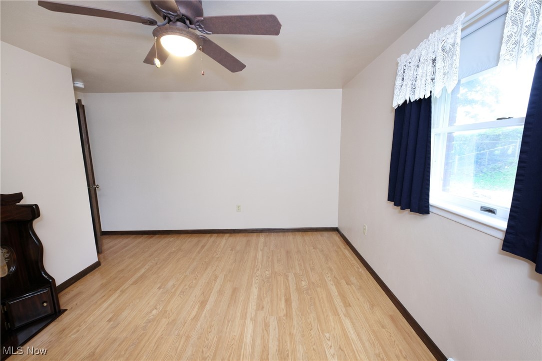 115 Carol Road Wellsburg, WV 26070 - Photo 26 of 36 Spare room with light wood-style flooring and a ceiling fan