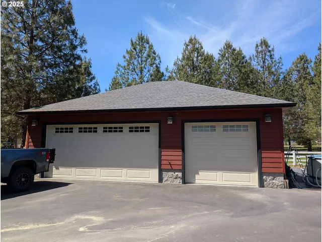 a front view of a house with a garage