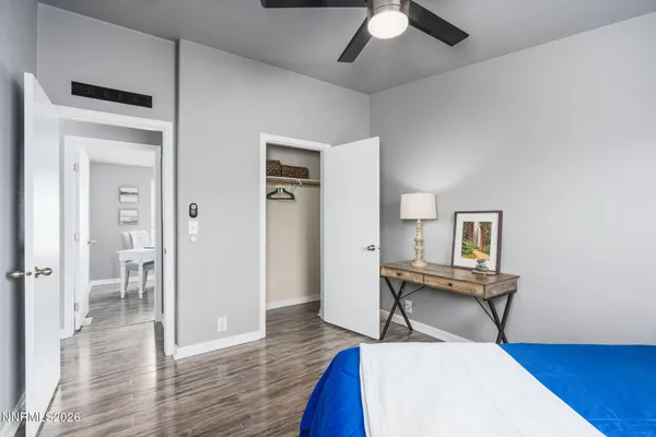 an aerial view of houses with a yard