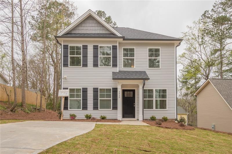 2540 Pilgrim Mill Road Cumming, GA 30041 - Photo 1 of 1 front view of a house with a yard