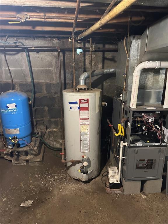 61 Mc Millan Road Mercer, PA 16137 - Photo 12 of 16 a room with water heater and storage
