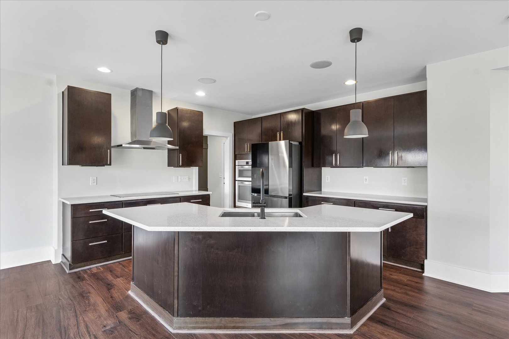 313 London Way Savoy, IL 61874 - Photo 22 of 85 a kitchen with stainless steel appliances granite countertop a sink a stove and a refrigerator