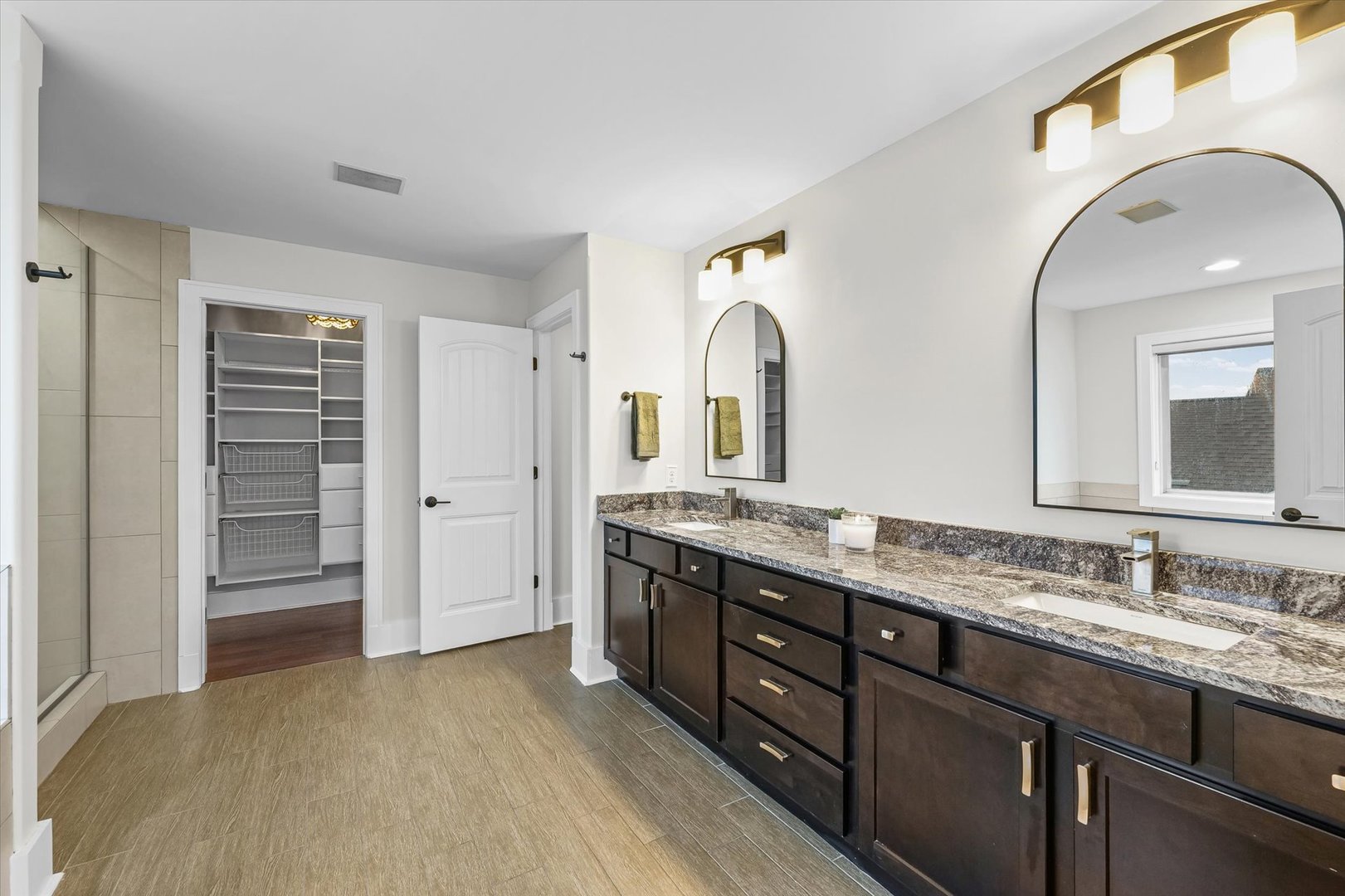 313 London Way Savoy, IL 61874 - Photo 45 of 85 a spacious bathroom with a granite countertop sink and a mirror