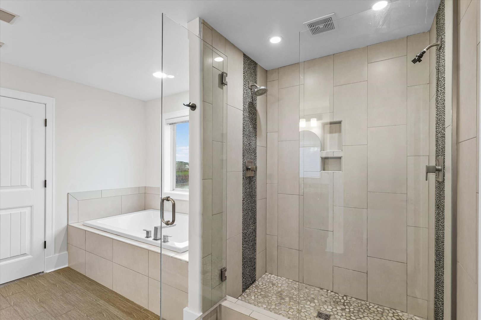 313 London Way Savoy, IL 61874 - Photo 47 of 85 a bathroom with a tub shower vanity and a sink