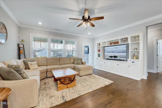 a kitchen with a stove a sink a counter space and dining table