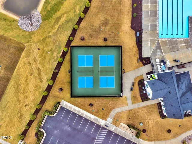 a view of a swimming pool with a lounge chairs