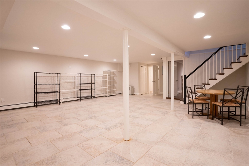 40 Puddingstone Lane Newton, MA 02459 - Photo 13 of 32 a view of an empty room with wooden floor