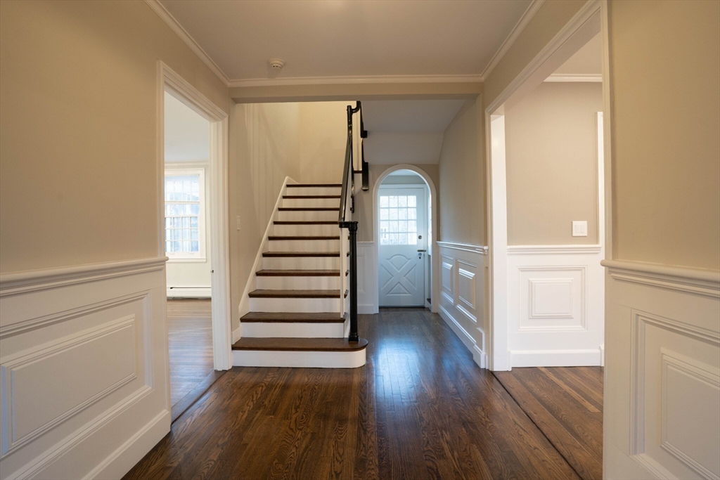 40 Puddingstone Lane Newton, MA 02459 - Photo 27 of 32 a view of wooden floor and windows in a room